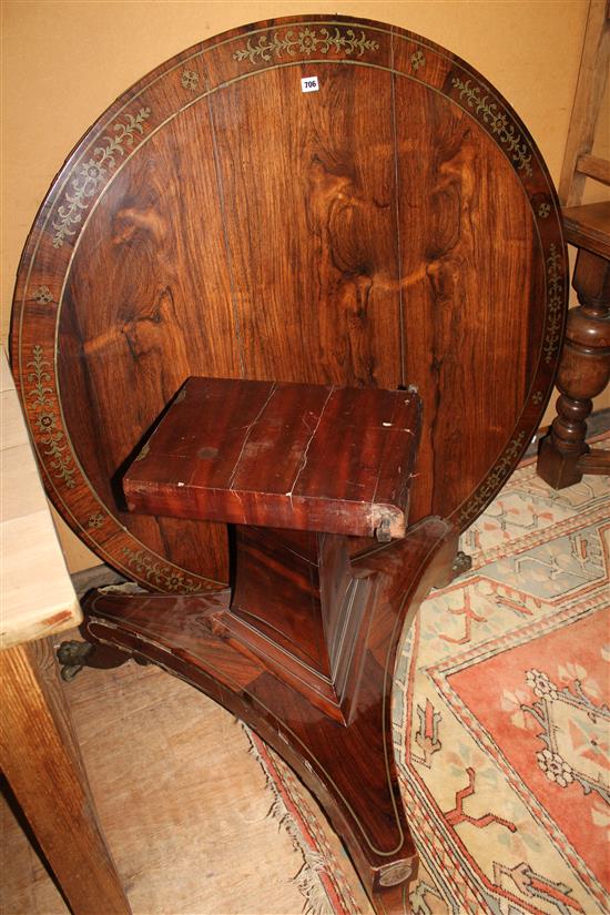 Circular rosewood breakfast table, brass-inlaid (a.f)